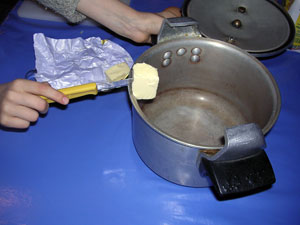 ajouter le beurre dans l'auto-cuiseur